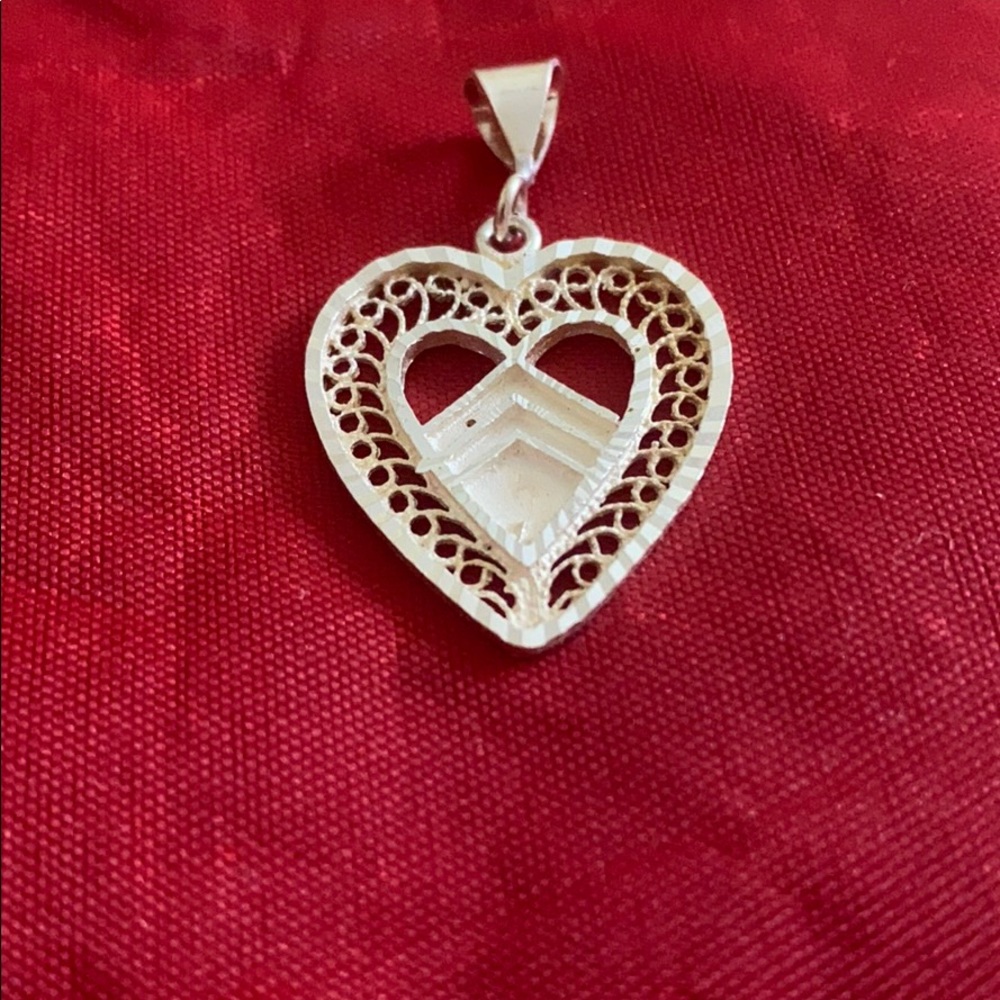 Silver  stamped 925 silver Heart  pendant .